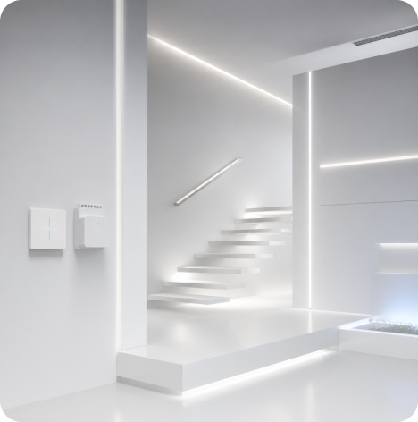 Modern white interior with floating stairs illuminated by LED strip lighting on walls and steps.